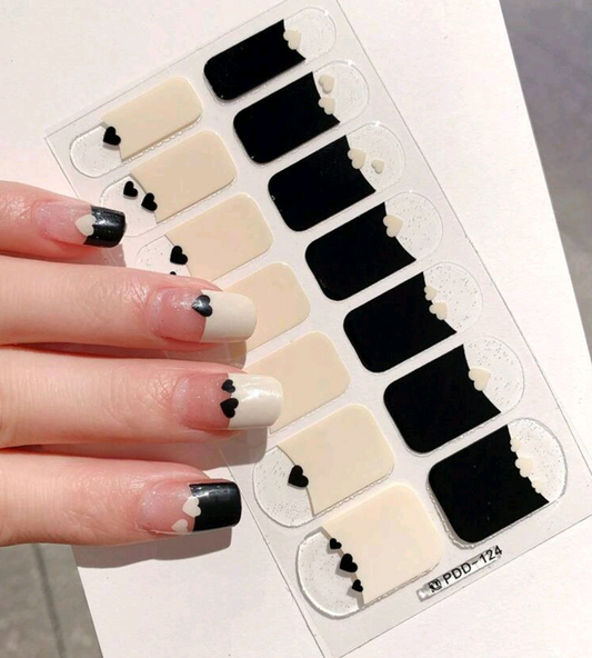 Playful black and white french tip nail wraps